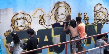 Crianças pintam muro na Mostra Cultural 2018 Cajun Bela Vista