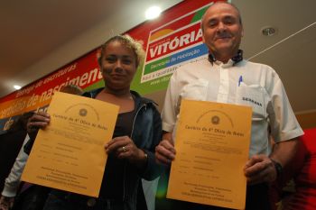 Entrega de escrituras à moradores do Morro do Macaco