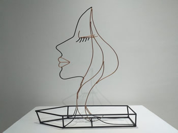 escultura barco mulher em ferro soldado